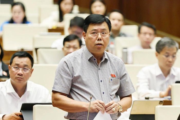 Bộ trưởng Bộ Nội vụ Nguyễn Tiến Hải phát biểu giải trình, làm rõ một số vấn đề đại biểu Quốc hội nêu. Ảnh: Doãn Tấn - TTXVN