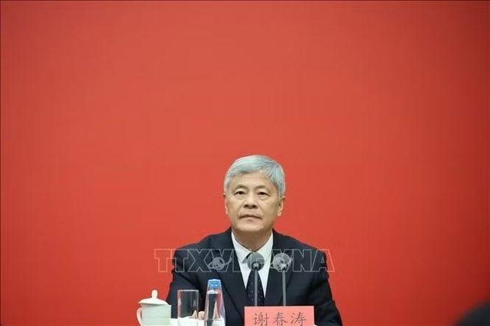 Phó Hiệu trưởng thường trực Trường Đảng Trung ương Trung Quốc Tạ Xuân Đào tại cuộc họp báo. Ảnh: Quang Hưng/PV TTXVN tại Trung Quốc