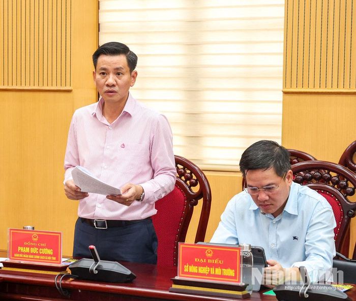 Đồng chí Phạm Đức Cường, Giám đốc Ngân hàng CSXH tỉnh báo cáo kết quả hoạt động của Ban đại diện HĐQT 9 tháng đầu năm 2026.