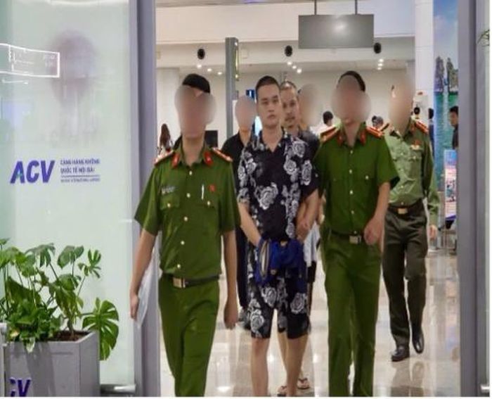 Đối tượng Phan Văn Triệu, Nguyễn Thanh Tuấn Duy bị Cơ quan Công an dẫn độ về Việt Nam. Ảnh: Đ.T