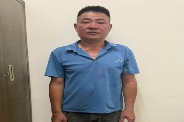 Ông Lê Xuân Hưng tại cơ quan công an. Ảnh CAHN
