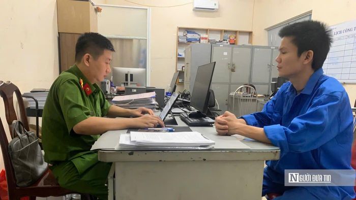 Đối tượng Đinh Mã Hoài Nam làm việc với Cơ quan điều tra. 