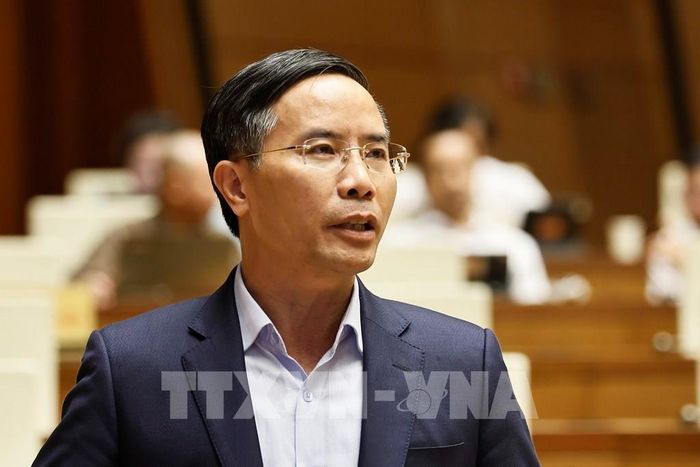 Thống đốc Ngân hàng Nhà nước Phạm Đức Ấn phát biểu giải trình, làm rõ một số vấn đề đại biểu Quốc hội nêu. Ảnh: Doãn Tấn – TTXVN