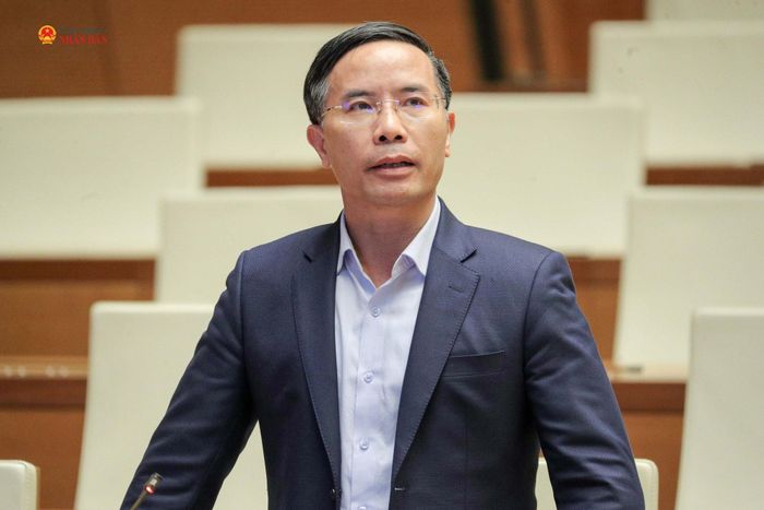 Thống đốc Ngân hàng Nhà nước Việt Nam Phạm Đức Ấn phát biểu làm rõ các nội dung ĐBQH đặt ra tại phiên thảo luận. Ảnh Hồ Long